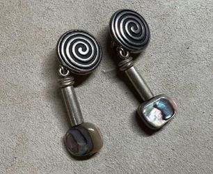 vintage silver-tone clip-on earrings with a spiral design and abalone shell drops