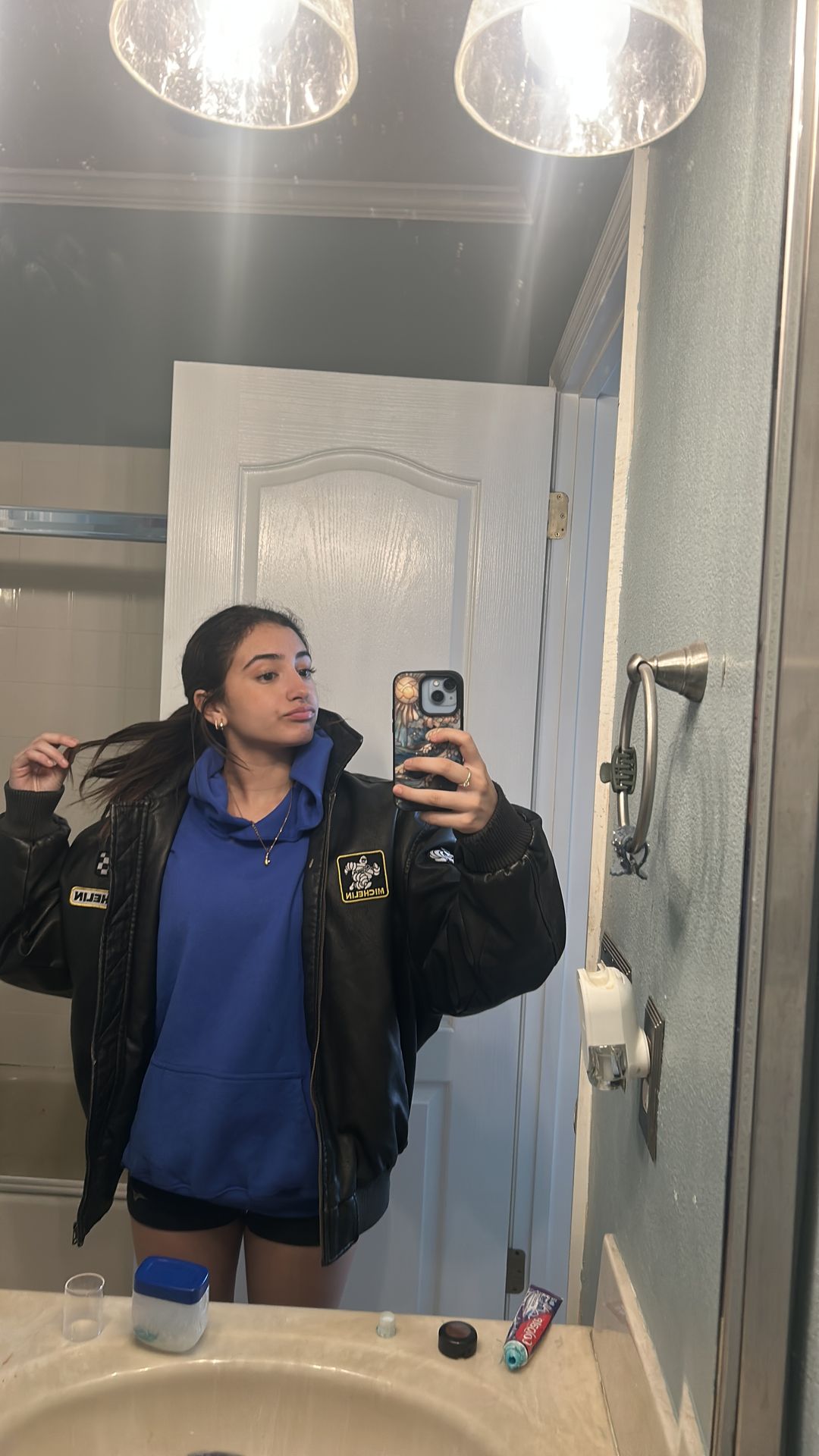 Black puffy racer jacket