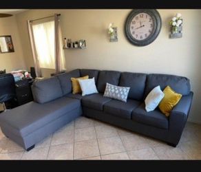 Beautiful Charcoal Grey Sectional couch from Living Spaces LIKE NEW