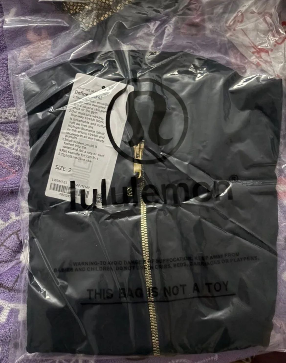 Lululemon Black With Gold Zipper Define Jacket