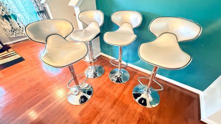 4 classy counter top stools and 4 dining table chairs for $120