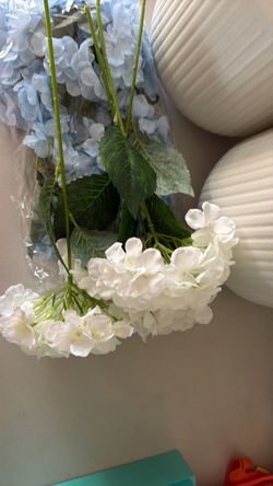 Plant pots with artificial flowers
