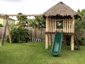 Huge play set treehouse swing palapa
