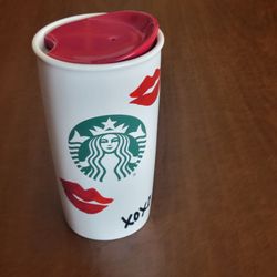 Starbucks 2015 Travel Tumbler Siren Logo XOXO Kisses Lips Coffee Mug 
with lid 12oz. Pre-owned, perfect shape, like new. No box.
it is 6" tall, weight