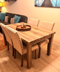 Dining set for sale!  Includes: • 1 table • 1 bench • 4 chairs