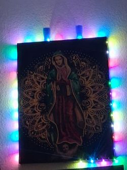 The virgin Mary hand painted with lights included