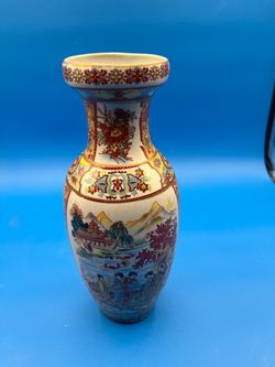 Chinese decorative vase with scenic floral design