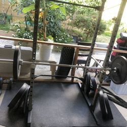Squat Rack With Barbell And Weights 