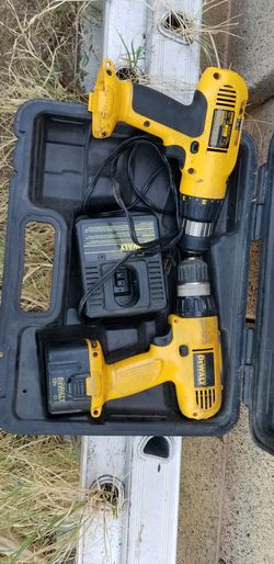 Pair of DeWalt drills 1 is 12 volts the other one is 9 volts make and offer