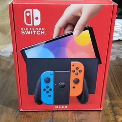 Pre-owned Nintendo Switch OLED Model Dockable Console w/ Neon Blue/Red Joy-Con