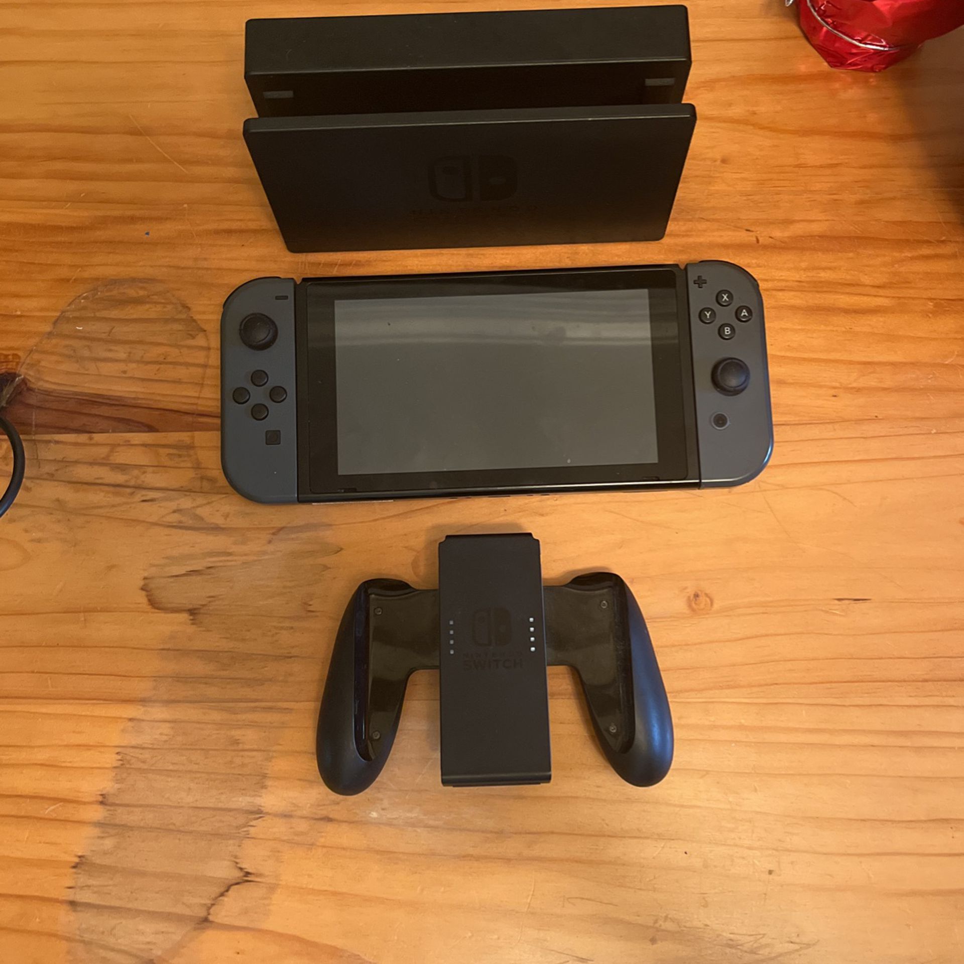 Nintendo Switch Console w/ Joy Con Grip, Dock, And Charger