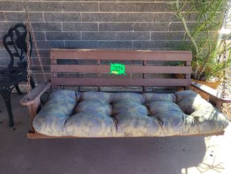Porch swing with cushion