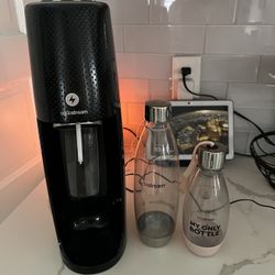 SodaStream- sparkling water maker with CO2 & 2 carbonating bottles.