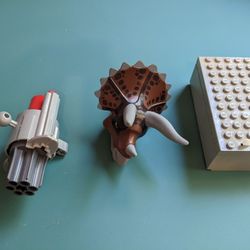 Lego Triceratops Head, Bionicles Blaster, And Battery Box