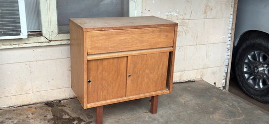 TV stand and a movie rack or accessory
