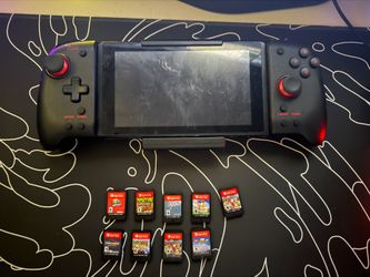Nintendo Switch and 9 Games obo
