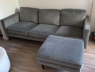 grey/blue couch with matching ottoman