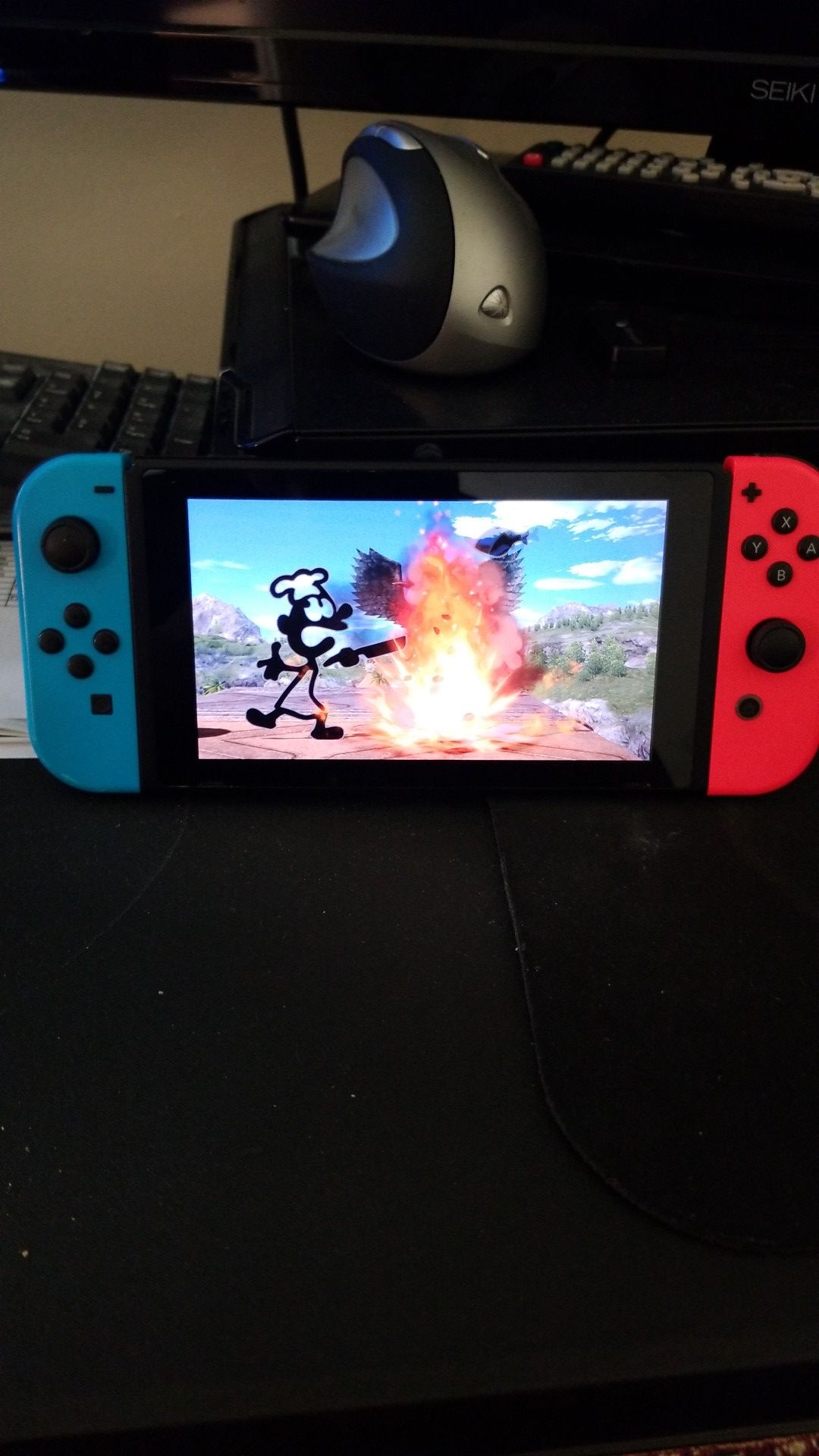 Nintendo switch comes with one power cord and Super Mario Smash Bros