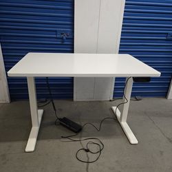 47 3/4   wide by 291/2 Electric sit and stand ergonomic desk