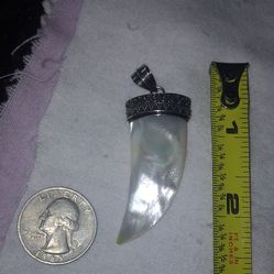 925 sterling silver mother of pearl tooth pendant made in Bali Indonesia