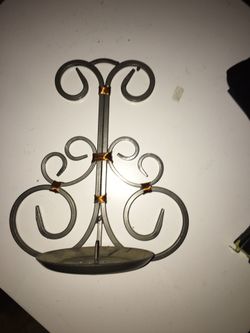 Heavy metal wall sconce candle holder