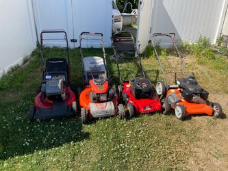 Three reconditioned lawn mowers