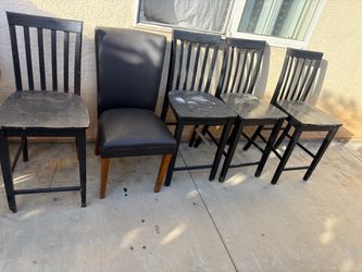 Mismatched Black Chairs – Set of 5