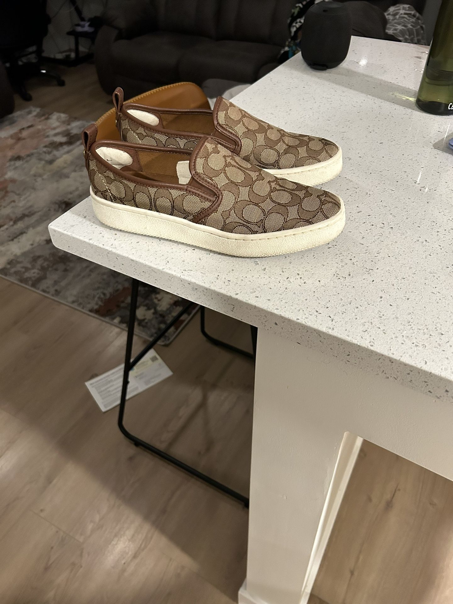 Coach Women’s Signature Slip-On Sneakers