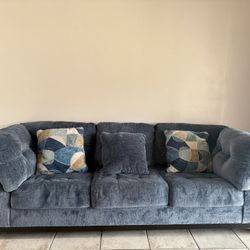 Blue Couches with 5 pillows