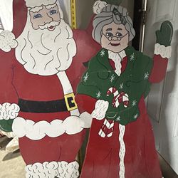 Wooden Cutout Santa And Mrs claus 