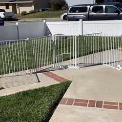 Pet or baby gate with swinging door and pet door —12 feet length