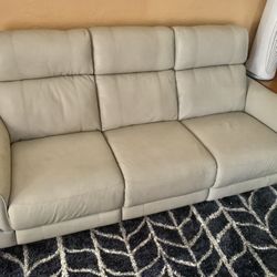 Like New Leather Electric Dual Reclining Couch With Electric Headrests And Dual Usb 