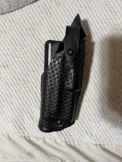 Like new, Black Basketweave Duty Holster with Belt Clip