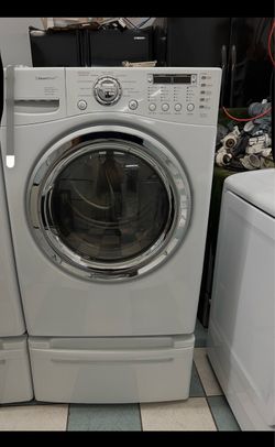 LG electric dryer with pedestal ( delivery available)