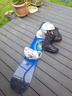 160cm wide burtonSnowboard with Bindings, Boots, and Helmet