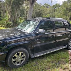 2003 Escalade EXT 154,000 Miles Interior Needs A Little Work But Everything Else Runs Great. The Best Car I Ever Had That Has A Baker engine, of power