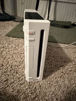 Wii console w twilight princess, 3 GameCube controllers and the motion adapter  (negotiable )