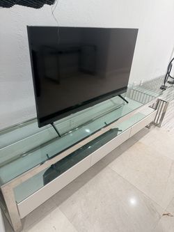 Modani TV Stand – Stainless Steel, Glass & 3 White Drawers