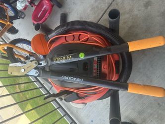 Rigid wet/dry commercial vacuum