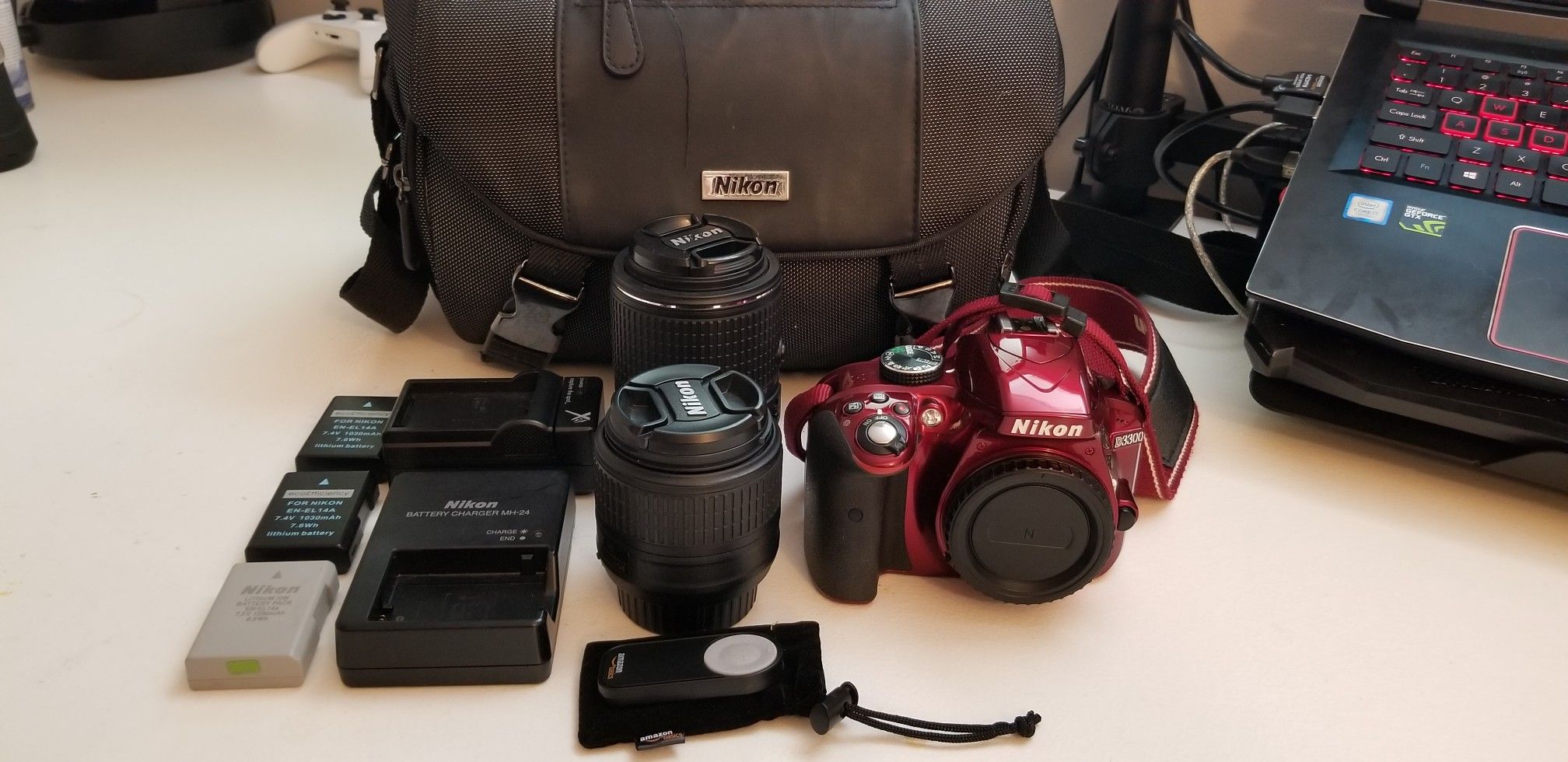 Nikon D3300 with extra batteries and lenses