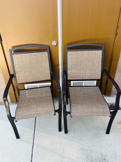 Set up two patio chairs