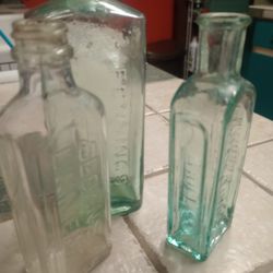 Three Antique Glass medicine bottles