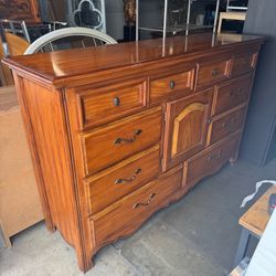 Solid Wood 8 Drawer Dresser with a Door Good Condition
