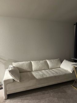 CB2 sofa with pillows