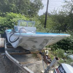 16’7” Boston Whaler And Trailer And Motor 