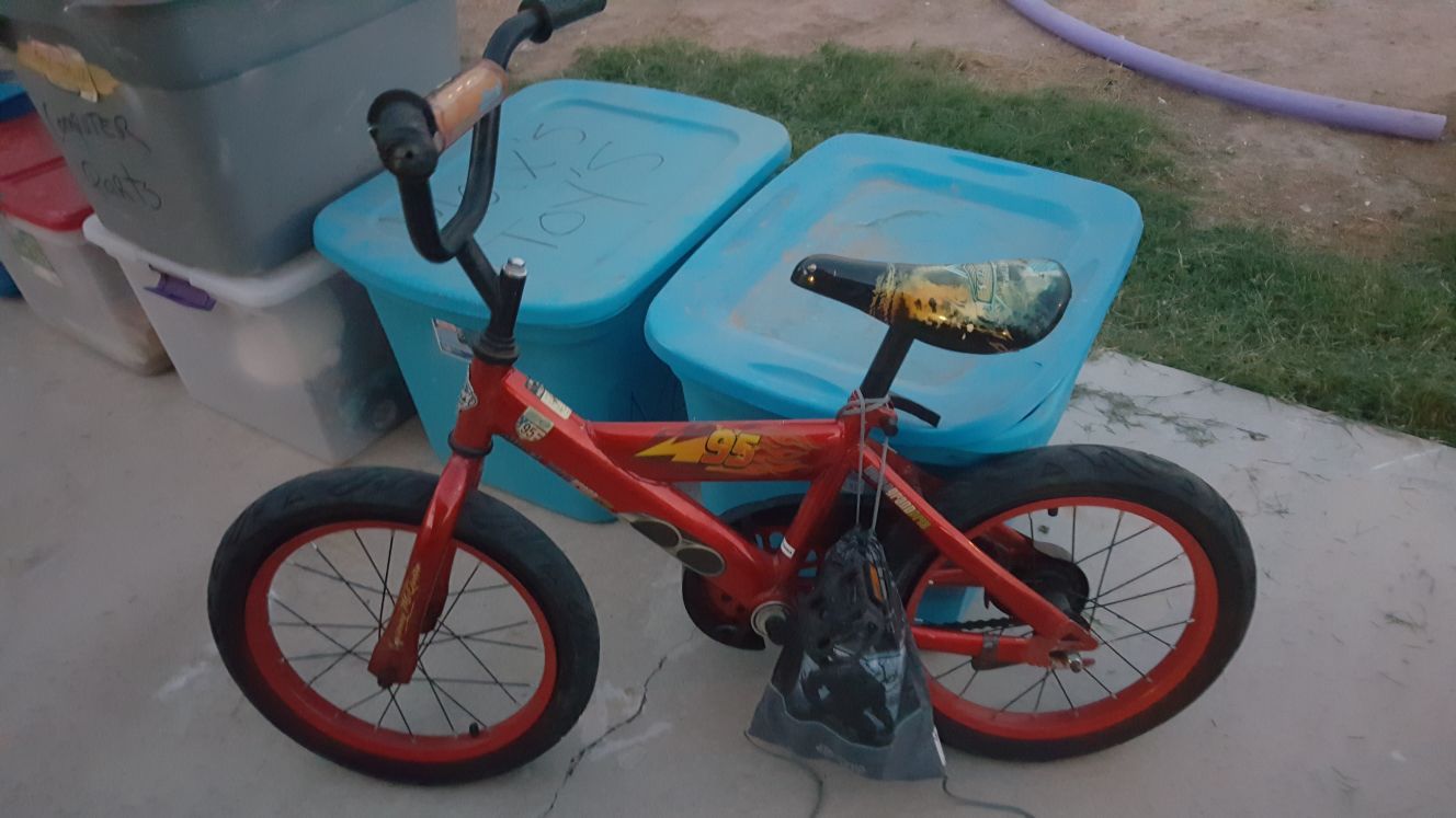 Childs Bike with /training wheels and matching Helmet throwin