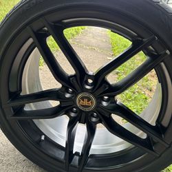 ALL 4 RIMS WITH BRAND NEW TIRES 