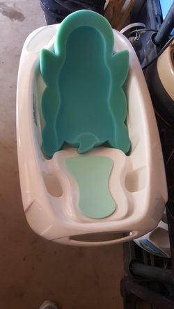 Fairly new baby bath tub