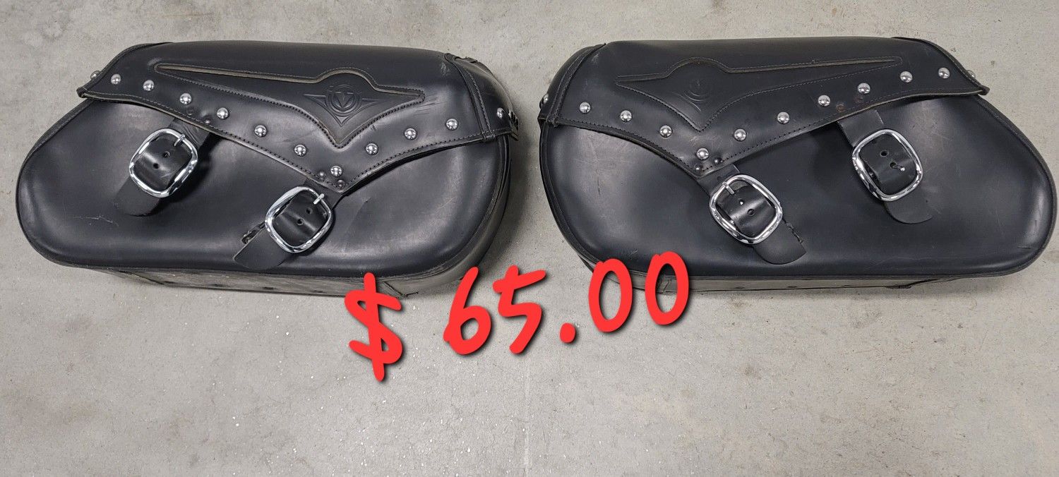 a pair of leather motorcycle cases in good condition