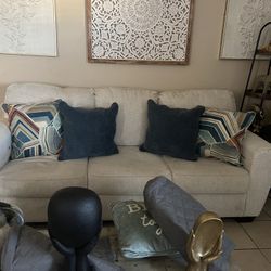 Selling the sofa, good condition, off-white with the pillows